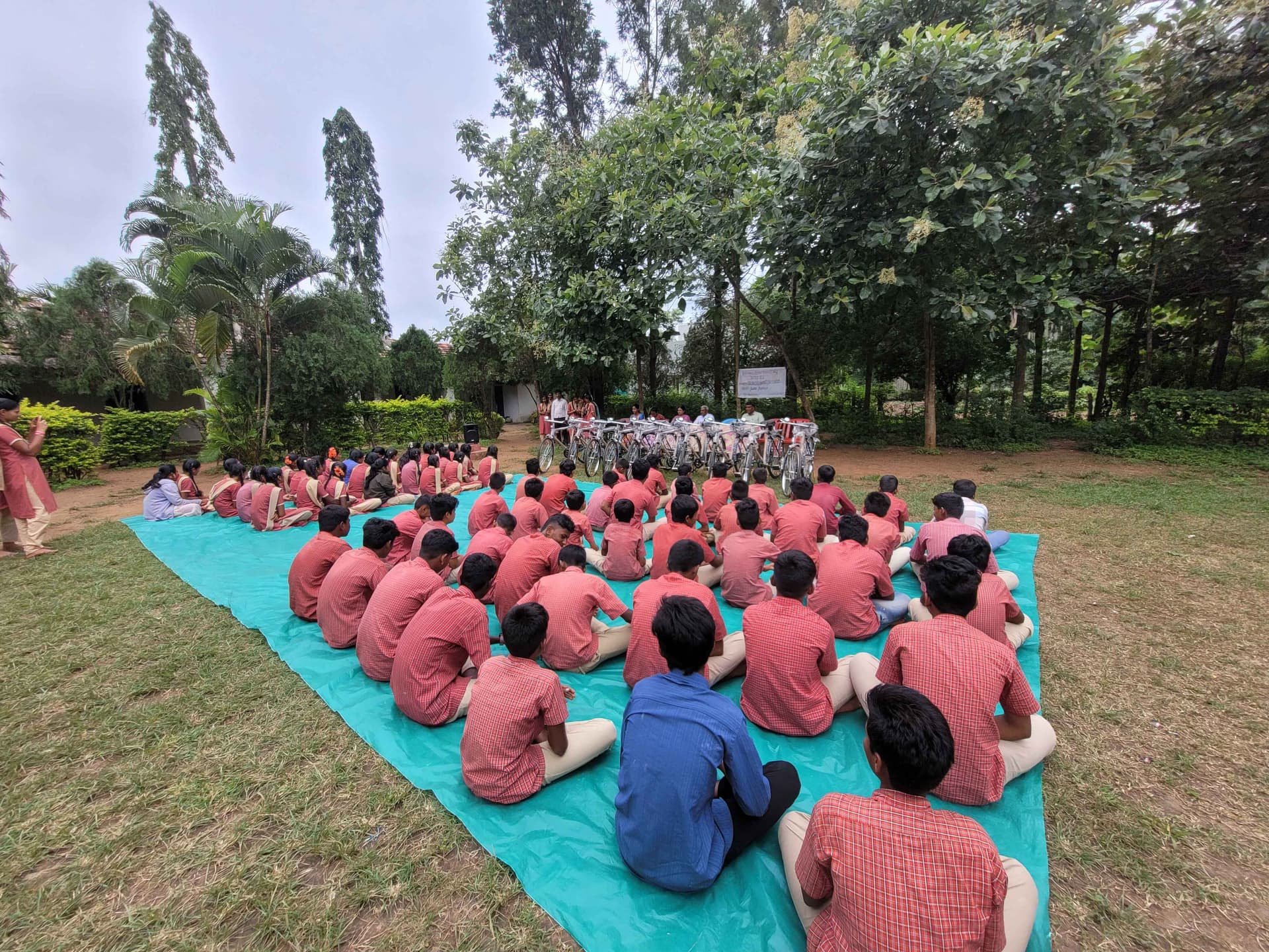 Students receiving bicycles at Sri Kariambha High School